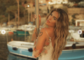 Karol G conquista Italia con un look bohemio que marca tendencia este verano